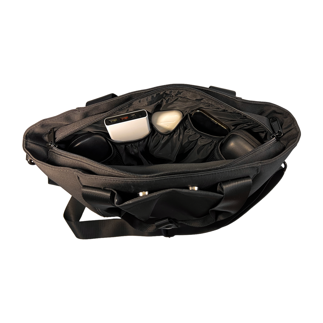 Inside of EscapeZone Stylish Women's Handbag with Faraday Pockets filled with Devices